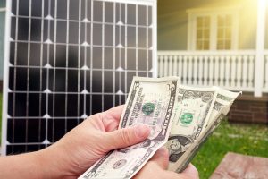 Homeowner save money with solar power panels