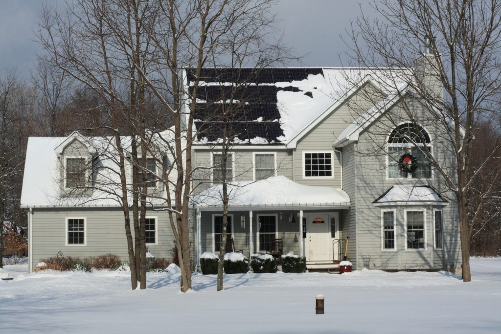 bad weather snow on solar panels
